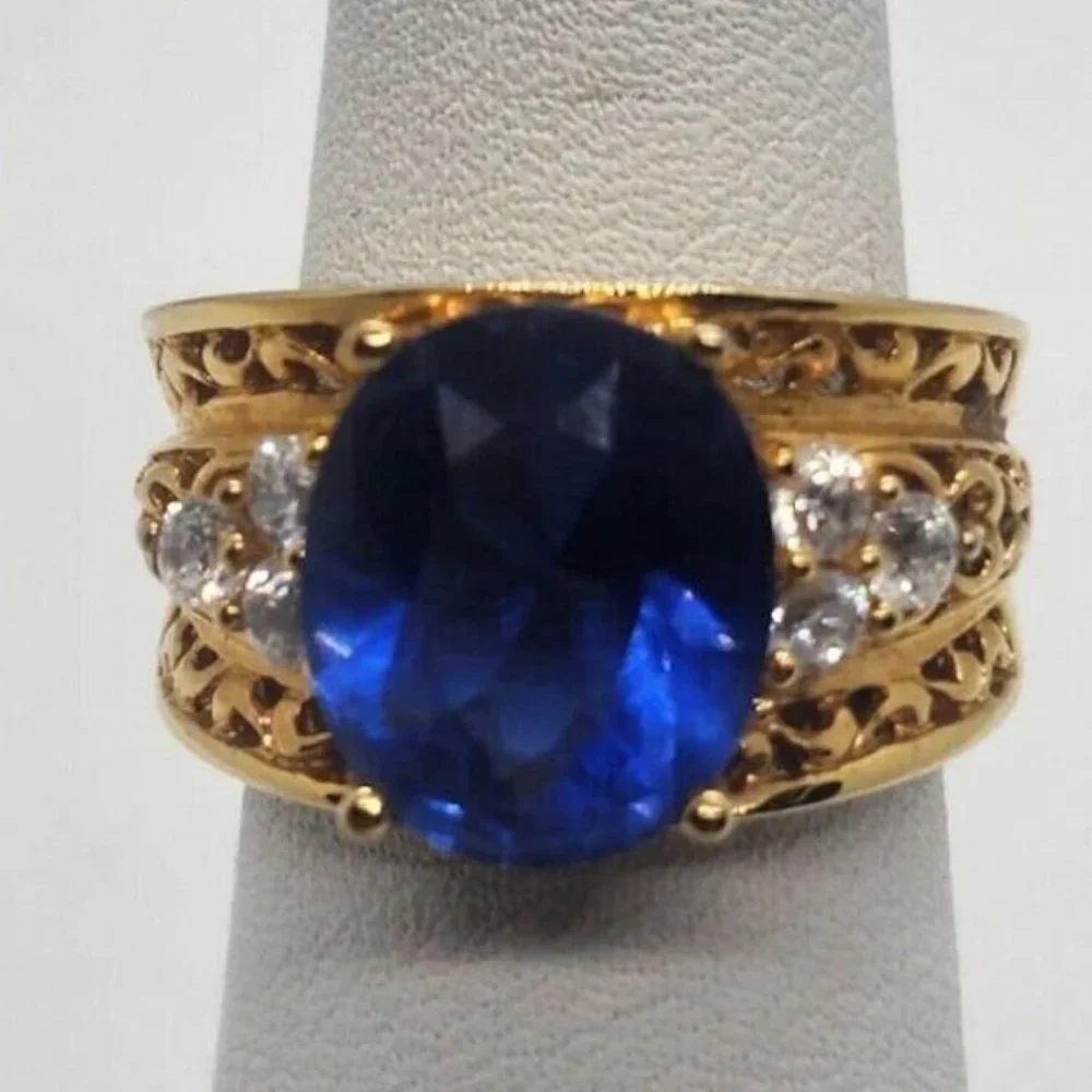 925 STERLING SILVER WITH CZ BLUE RING SIZE 5